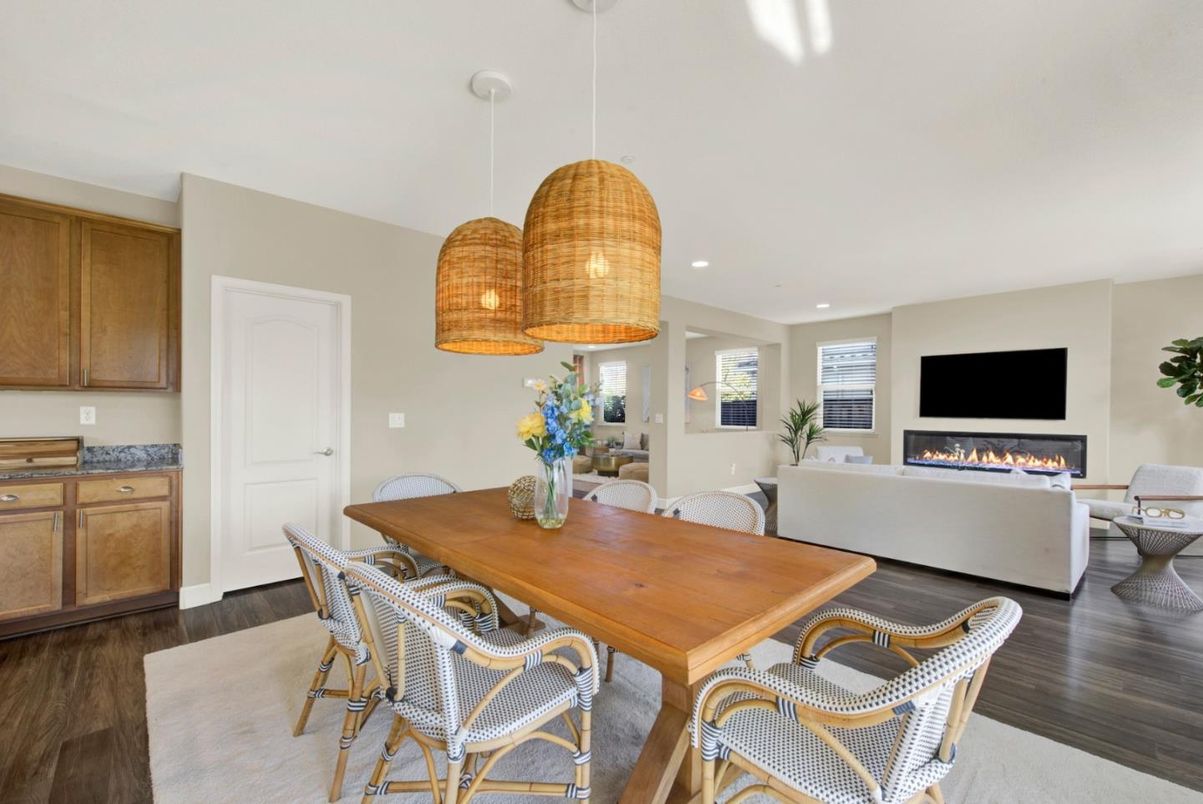 Dining room, Fireplace, Interior, Living room, Pendant Lights, Recessed Lighting, Wood Texture Flooring