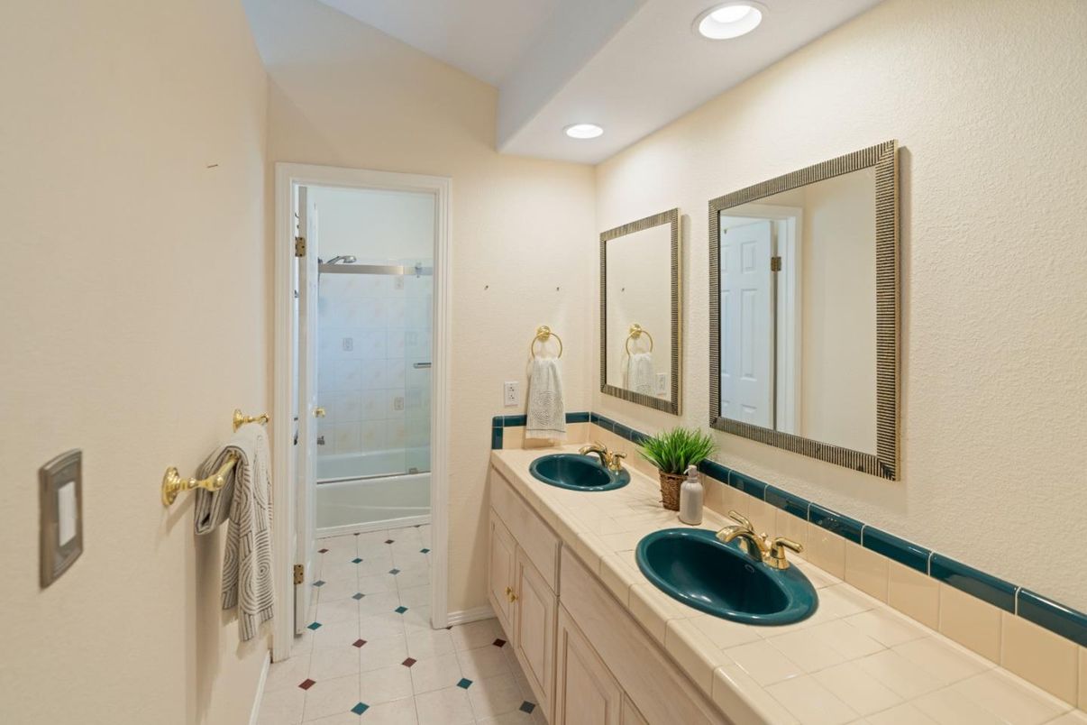 Bathroom, Dual Sink Vanities, Glass Shower, Interior, Recessed Lighting, Tile Countertops