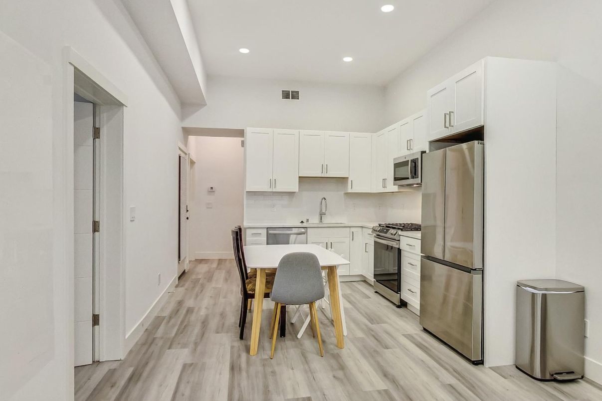 Dining room, Interior, Kitchen, Recessed Lighting, Stainless Steel Appliances, Wood Texture Flooring