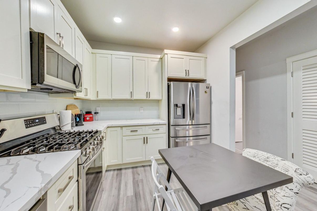 Interior, Kitchen, Recessed Lighting, Stainless Steel Appliances, Wood Texture Flooring