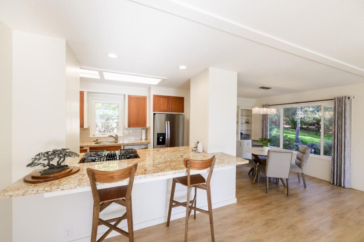 Chandelier, Dining room, Interior, Kitchen, Recessed Lighting, Stainless Steel Appliances, Wood Texture Flooring