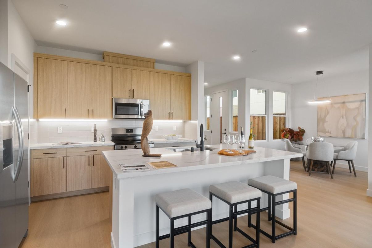 Dining room, Interior, Kitchen, Pendant Lights, Recessed Lighting, Stainless Steel Appliances, Wood Texture Flooring
