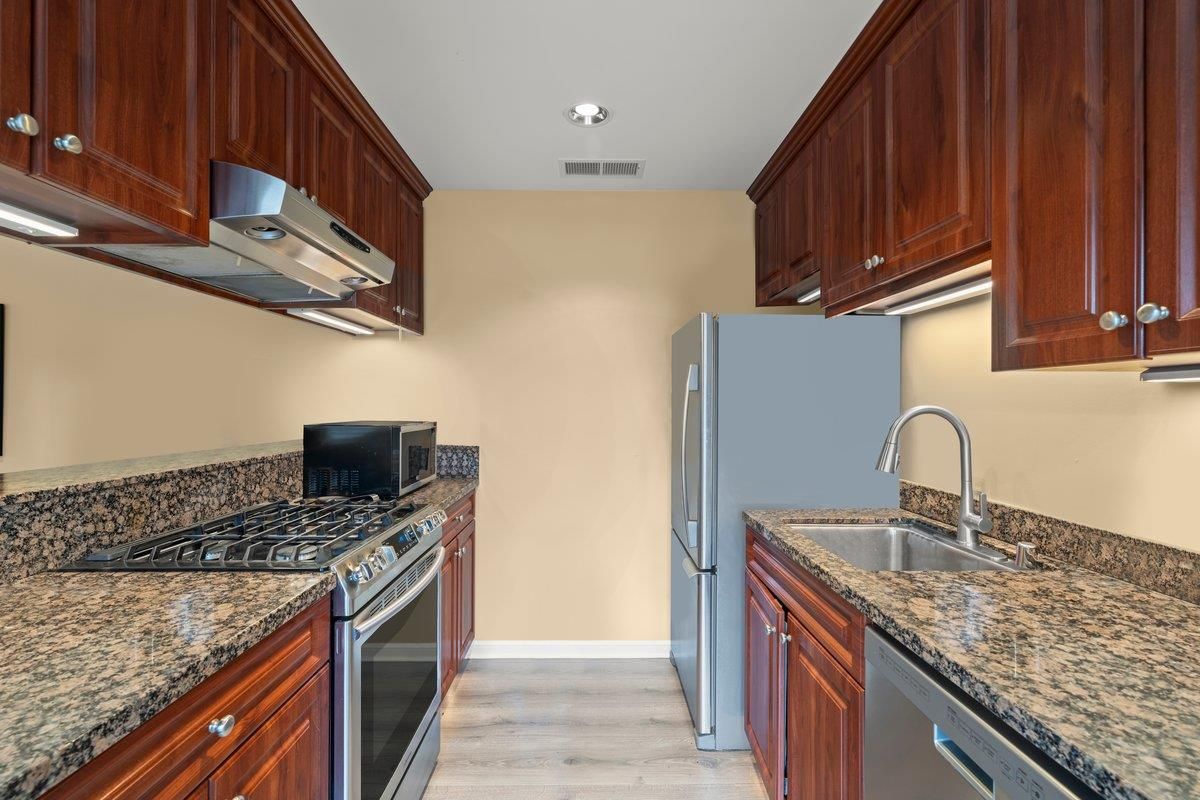 Interior, Kitchen, Recessed Lighting, Stainless Steel Appliances, Wood Texture Flooring