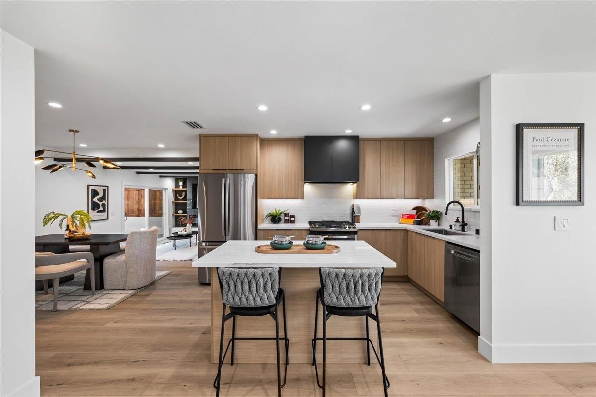 Dining room, Interior, Kitchen, Pendant Lights, Recessed Lighting, Stainless Steel Appliances, Wood Texture Flooring