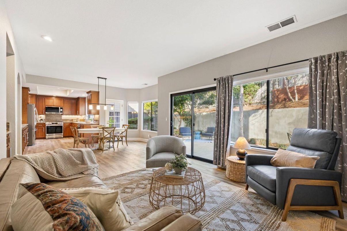 Dining room, Interior, Kitchen, Living room, Pendant Lights, Recessed Lighting, Stainless Steel Appliances, Wood Texture Flooring