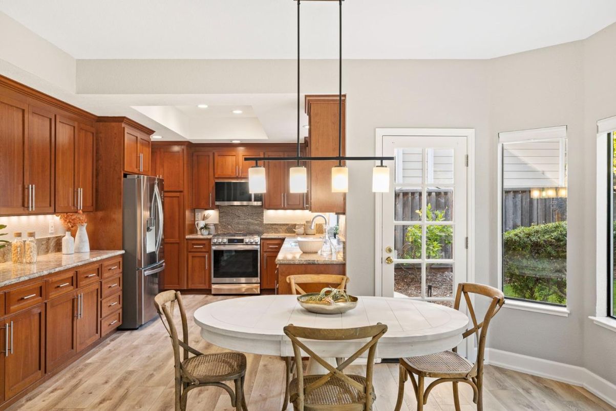Dining room, Interior, Kitchen, Pendant Lights, Recessed Lighting, Stainless Steel Appliances, Wood Texture Flooring