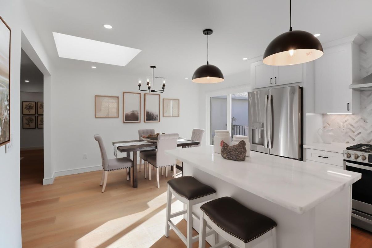 Dining room, Interior, Kitchen, Pendant Lights, Recessed Lighting, Stainless Steel Appliances, Wood Texture Flooring