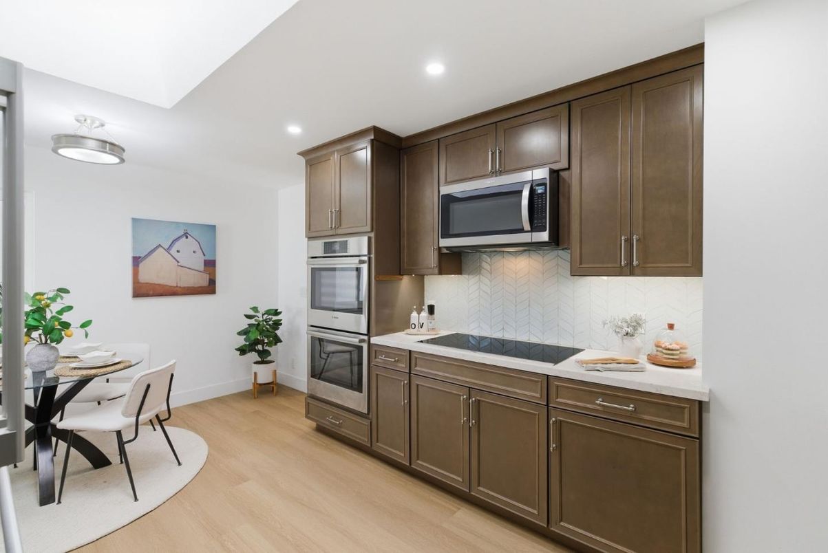 Dining room, Interior, Kitchen, Recessed Lighting, Stainless Steel Appliances, Wood Texture Flooring