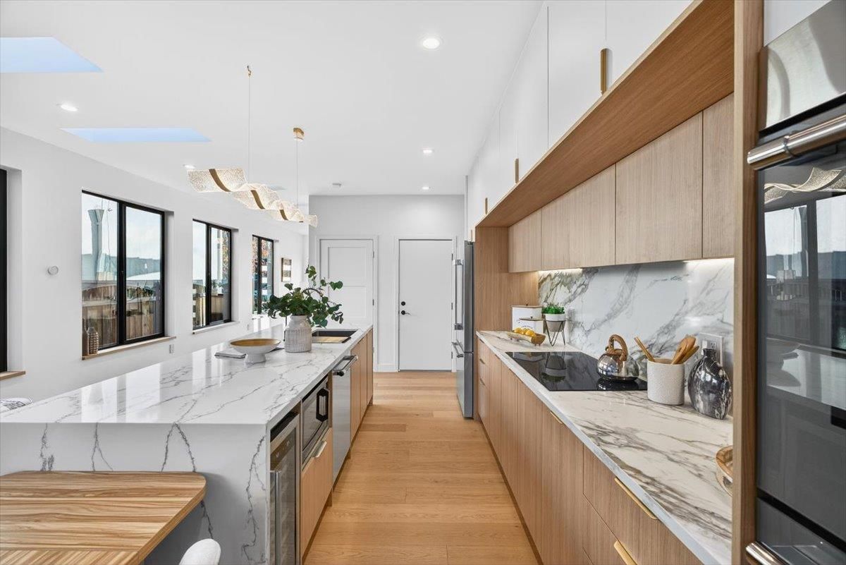 Interior, Kitchen, Pendant Lights, Recessed Lighting, Stainless Steel Appliances, Wood Texture Flooring