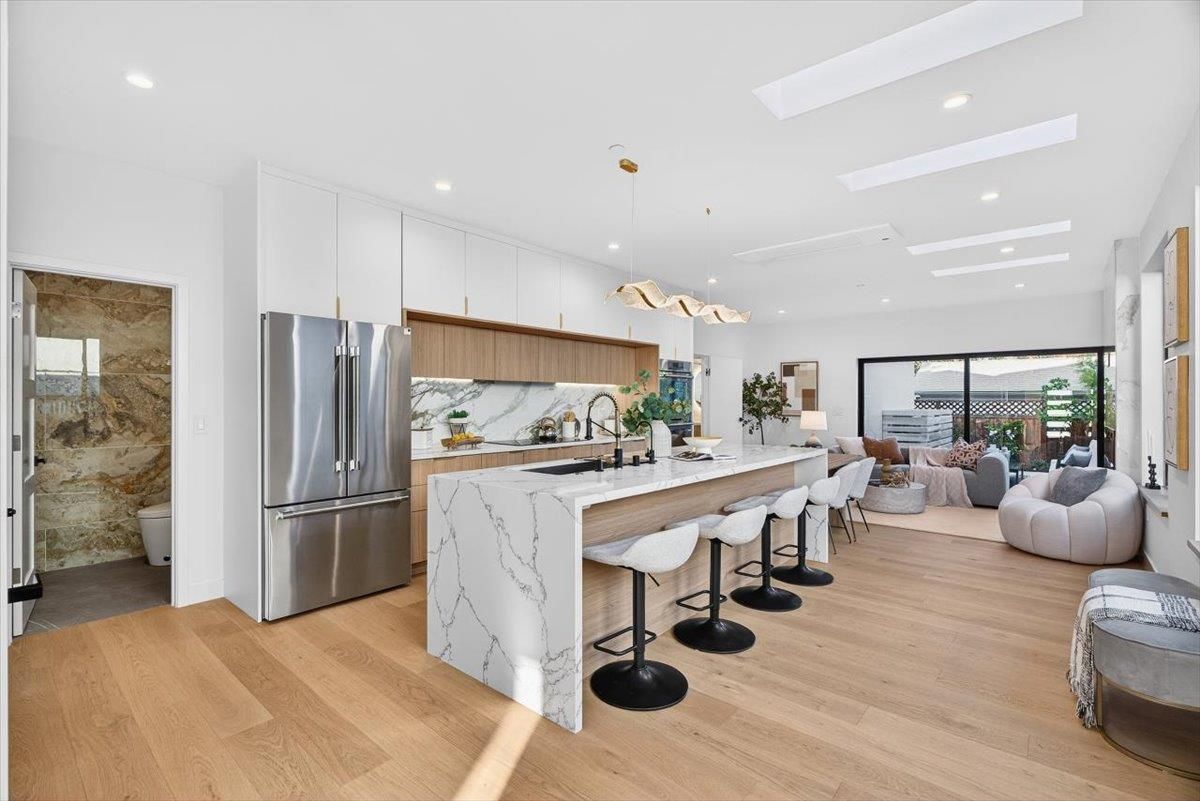 Interior, Kitchen, Living room, Marble Walls, Pendant Lights, Recessed Lighting, Stainless Steel Appliances, Wood Texture Flooring