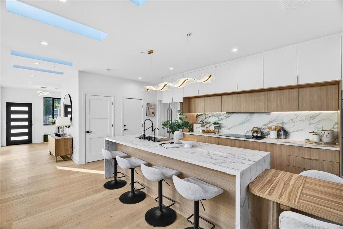 Interior, Kitchen, Marble Walls, Pendant Lights, Recessed Lighting, Wood Texture Flooring