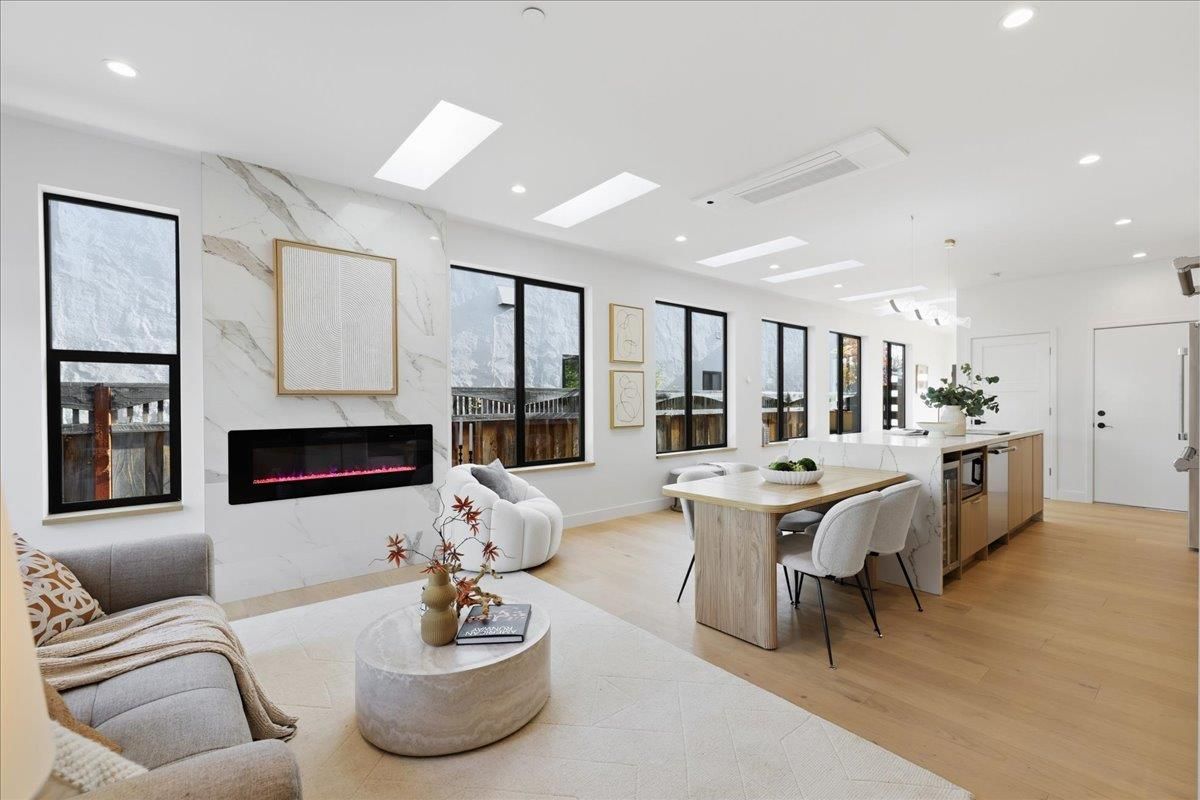 Dining room, Fireplace, Interior, Kitchen, Living room, Marble Walls, Pendant Lights, Recessed Lighting, Wood Texture Flooring