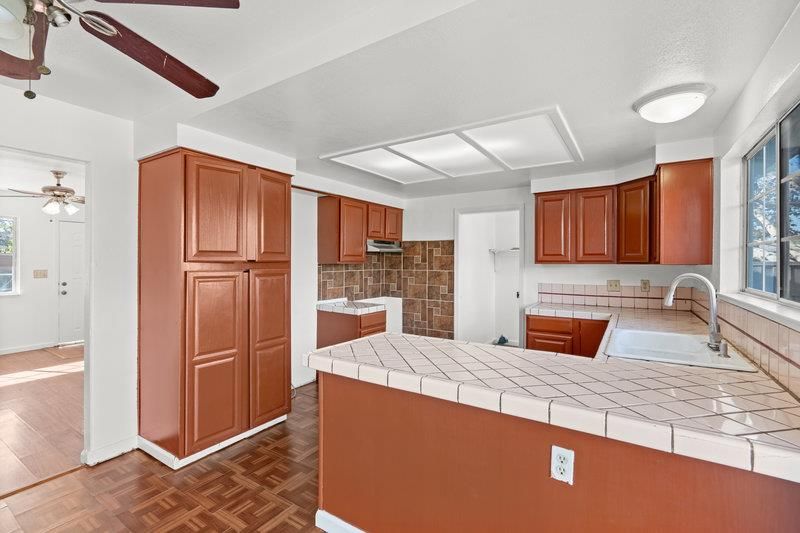 Interior, Kitchen, Tile Countertops, Wood Texture Flooring