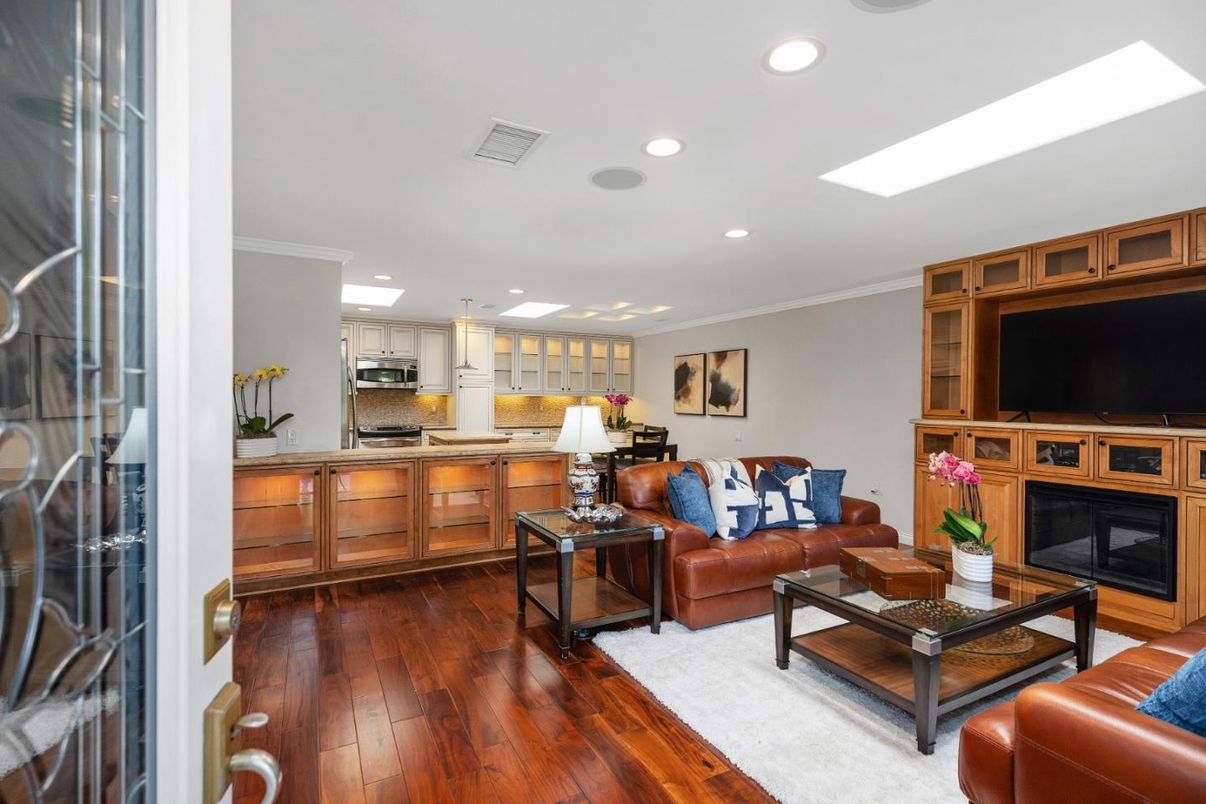 Fireplace, Interior, Kitchen, Living room, Recessed Lighting, Stainless Steel Appliances, Wood Texture Flooring