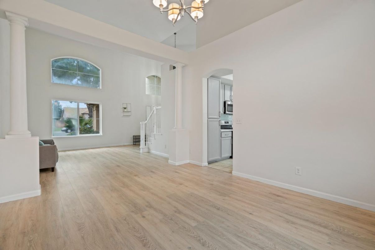 Chandelier, Empty room, Interior, Kitchen, Stainless Steel Appliances, Wood Texture Flooring