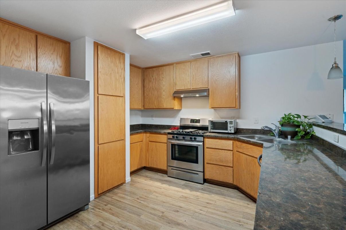 Interior, Kitchen, Pendant Lights, Stainless Steel Appliances, Wood Texture Flooring