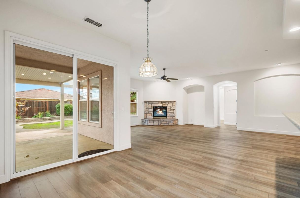 Empty room, Fireplace, Interior, Pendant Lights, Recessed Lighting, Wood Texture Flooring