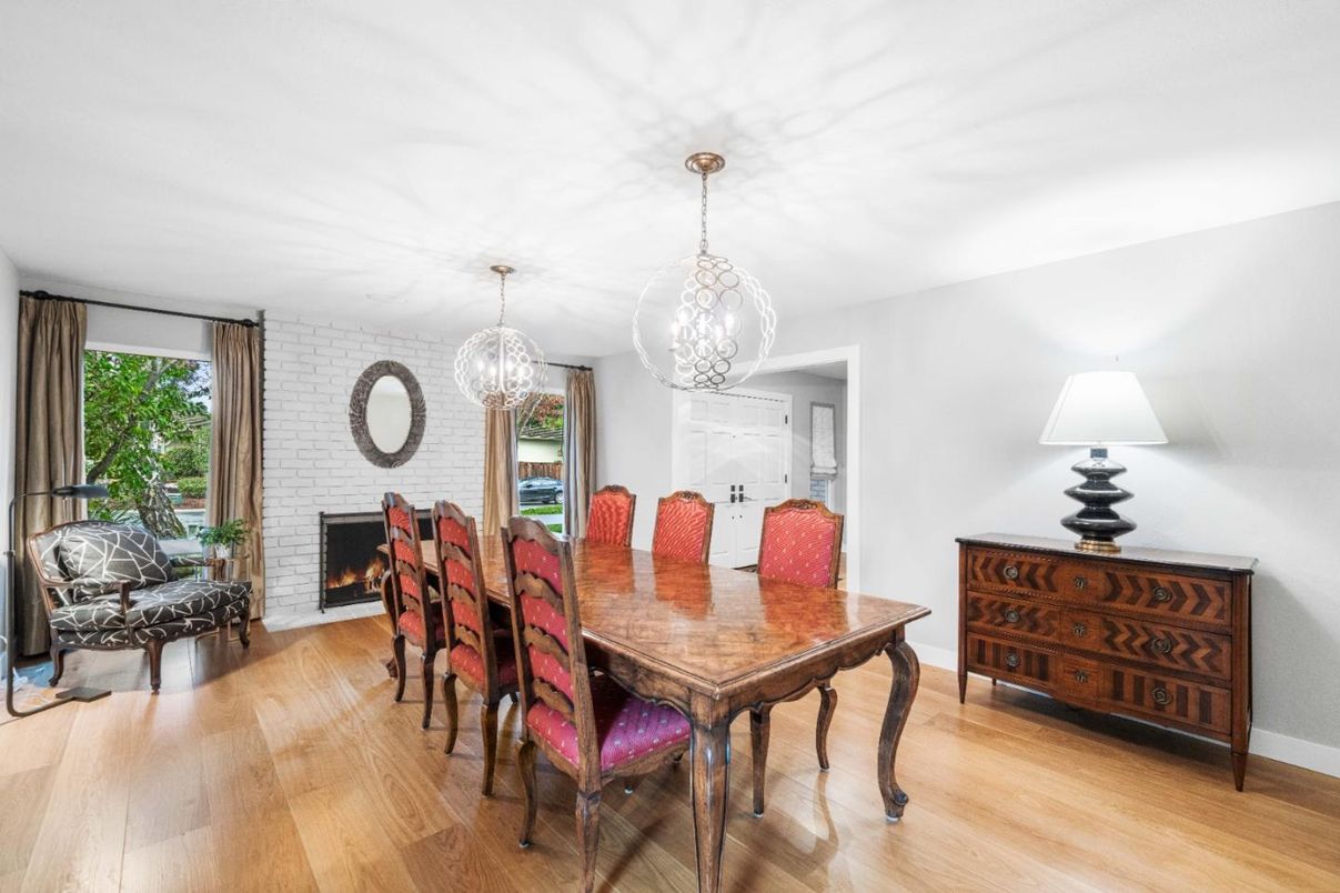 Dining room, Fireplace, Interior, Pendant Lights, Stone Walls, Wood Texture Flooring