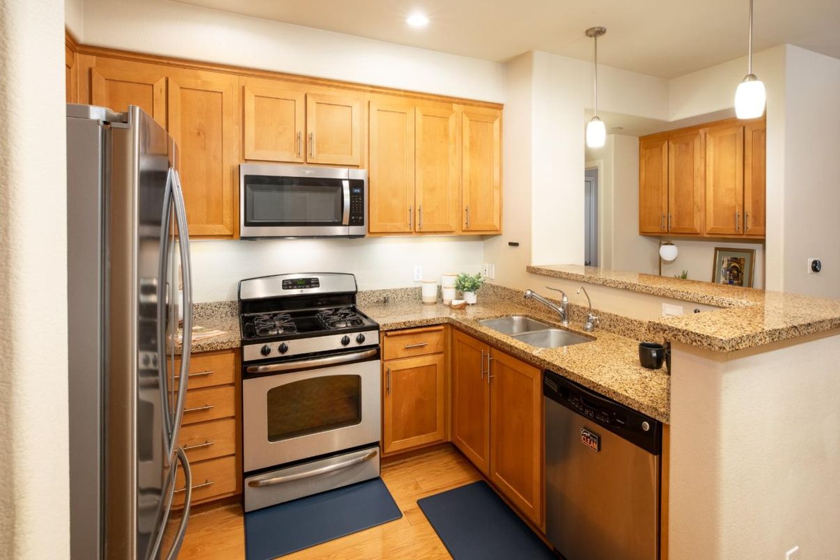 Interior, Kitchen, Pendant Lights, Recessed Lighting, Stainless Steel Appliances, Wood Texture Flooring