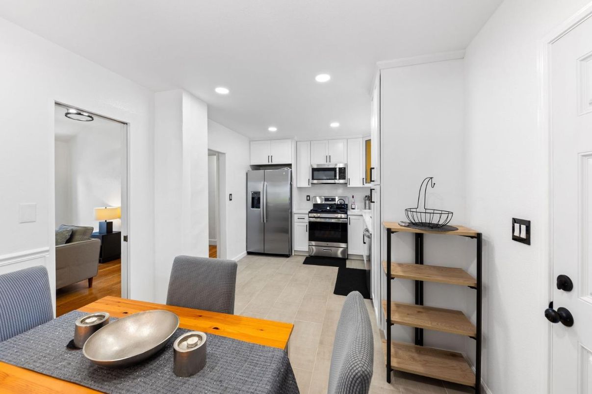 Dining room, Interior, Kitchen, Recessed Lighting, Stainless Steel Appliances, Wood Texture Flooring