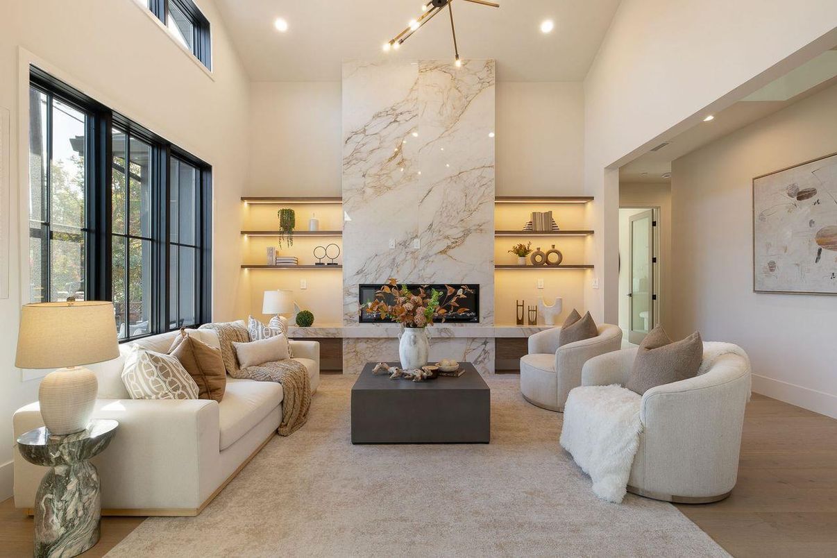 Fireplace, Interior, Living room, Marble Walls, Pendant Lights, Recessed Lighting, Wood Texture Flooring