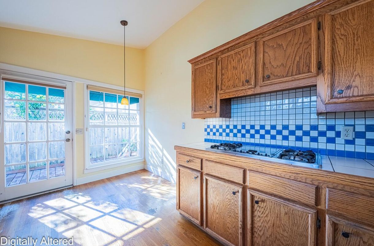 Interior, Kitchen, Pendant Lights, Tile Countertops, Wood Texture Flooring