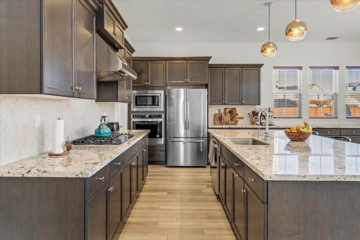 Interior, Kitchen, Pendant Lights, Recessed Lighting, Stainless Steel Appliances, Wood Texture Flooring