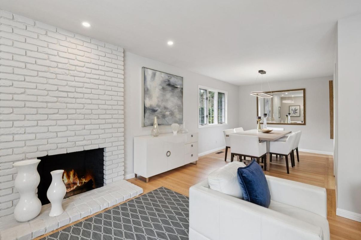 Dining room, Fireplace, Interior, Pendant Lights, Recessed Lighting, Stone Walls, Wood Texture Flooring