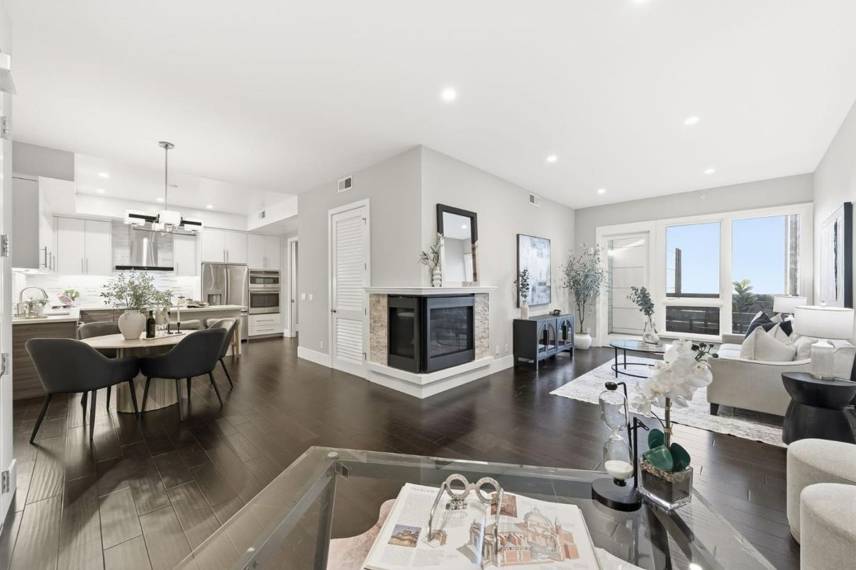 Dining room, Fireplace, Interior, Kitchen, Living room, Pendant Lights, Recessed Lighting, Stainless Steel Appliances, Wood Texture Flooring