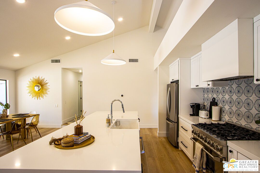 Dining room, Interior, Kitchen, Pendant Lights, Recessed Lighting, Stainless Steel Appliances, Wood Texture Flooring