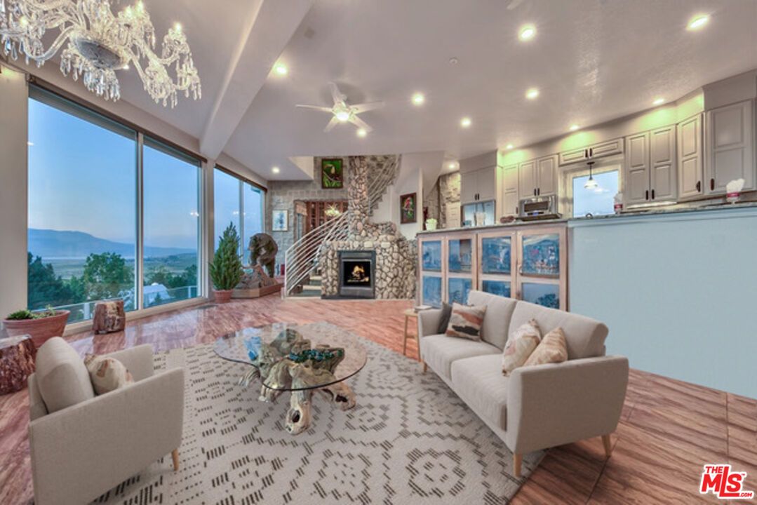 Fireplace, Interior, Kitchen, Living room, Recessed Lighting, Stone Walls, Wood Texture Flooring