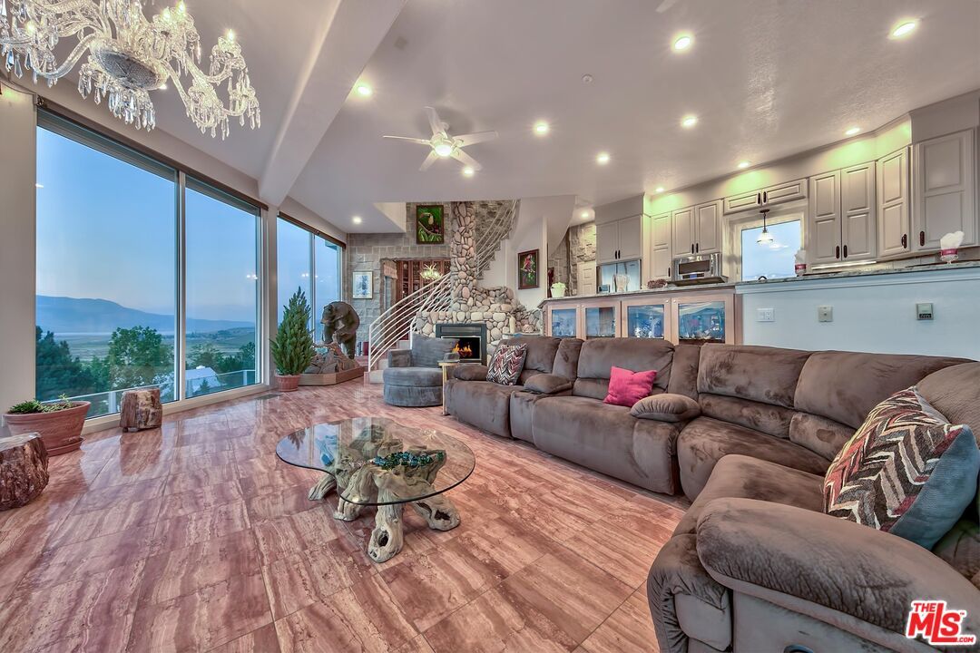 Fireplace, Interior, Kitchen, Living room, Recessed Lighting, Stone Walls, Wood Texture Flooring