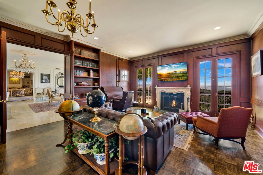 Chandelier, Fireplace, Interior, Living room, Recessed Lighting, Wood Texture Flooring, Wooden Walls