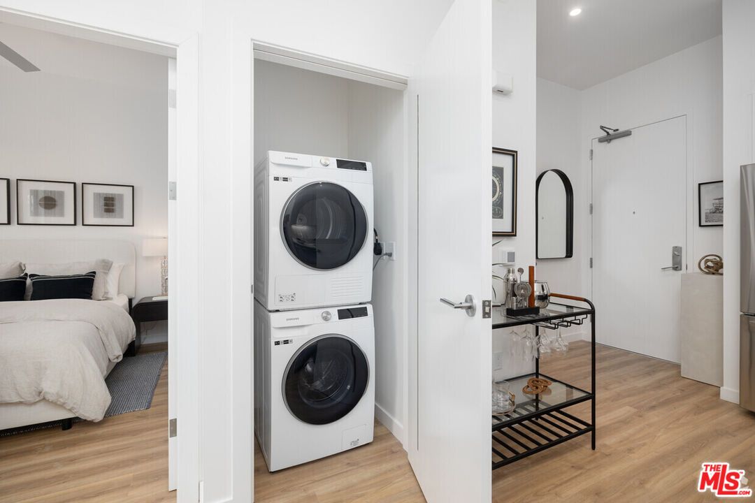 Bedroom, Interior, Recessed Lighting, Utility Closets, Washer, Wood Texture Flooring