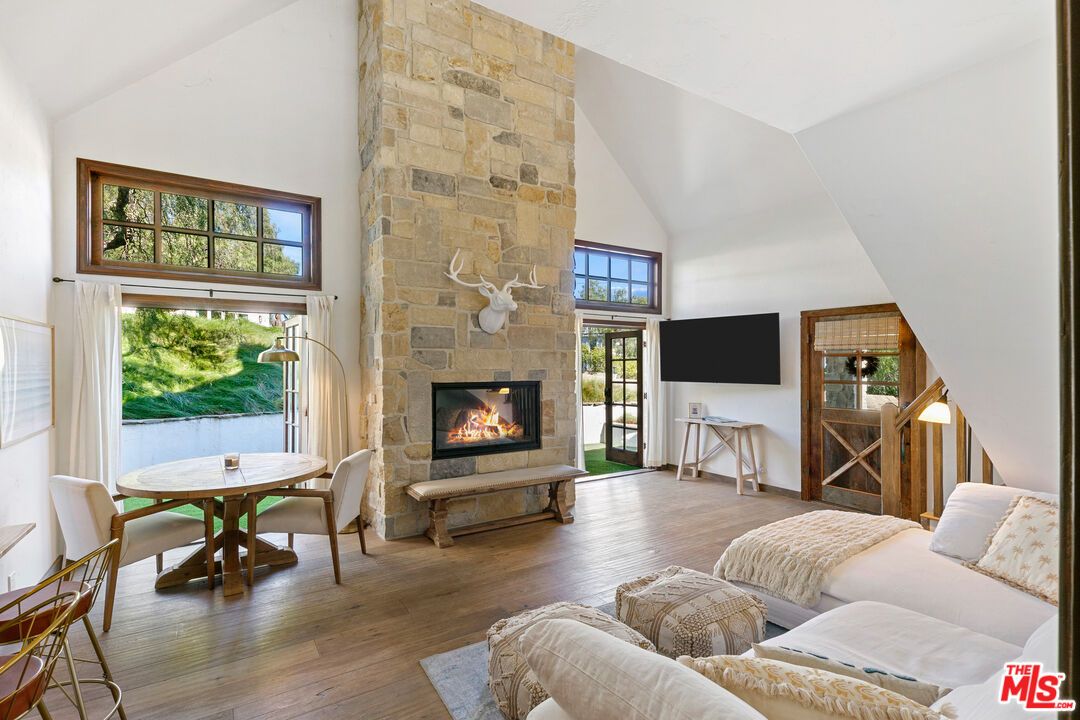 Dining room, Fireplace, Interior, Living room, Stone Walls, Wood Texture Flooring