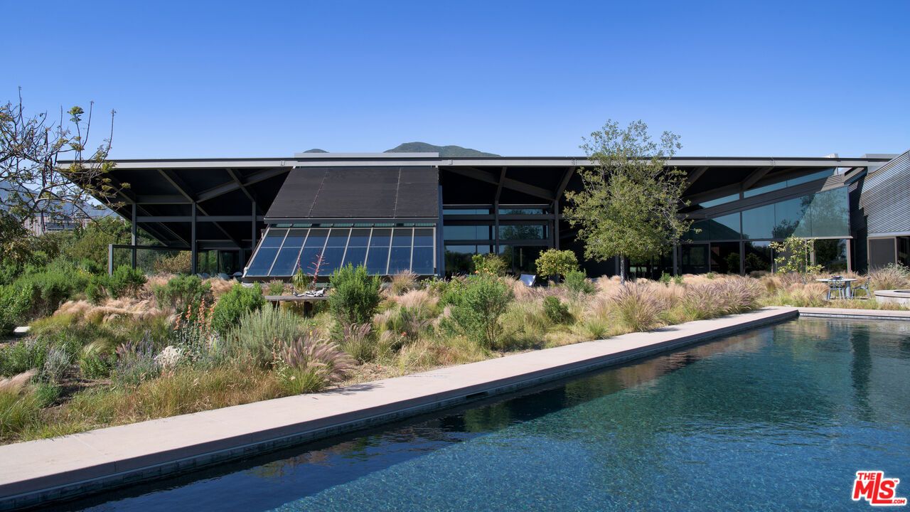 Exterior, Pool, Solar Panels