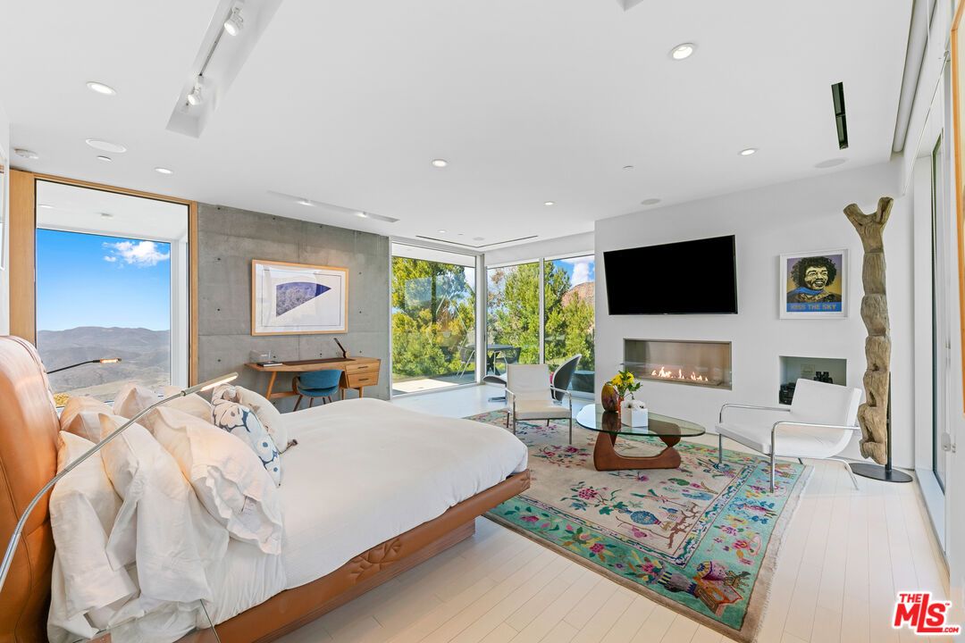 Bedroom, Fireplace, Interior, Recessed Lighting, Wood Texture Flooring