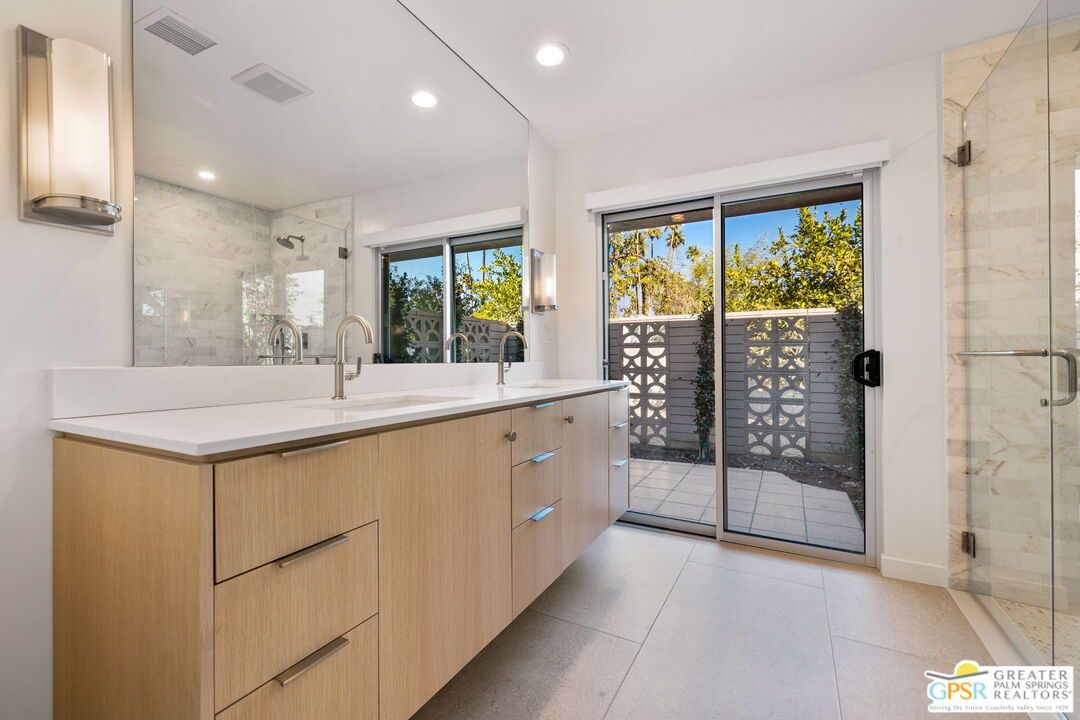 Bathroom, Dual Sink Vanities, Glass Shower, Interior, Marble Walls, Recessed Lighting