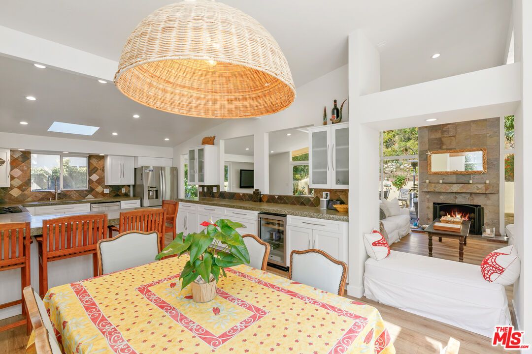 Dining room, Fireplace, Interior, Kitchen, Living room, Recessed Lighting, Wood Texture Flooring