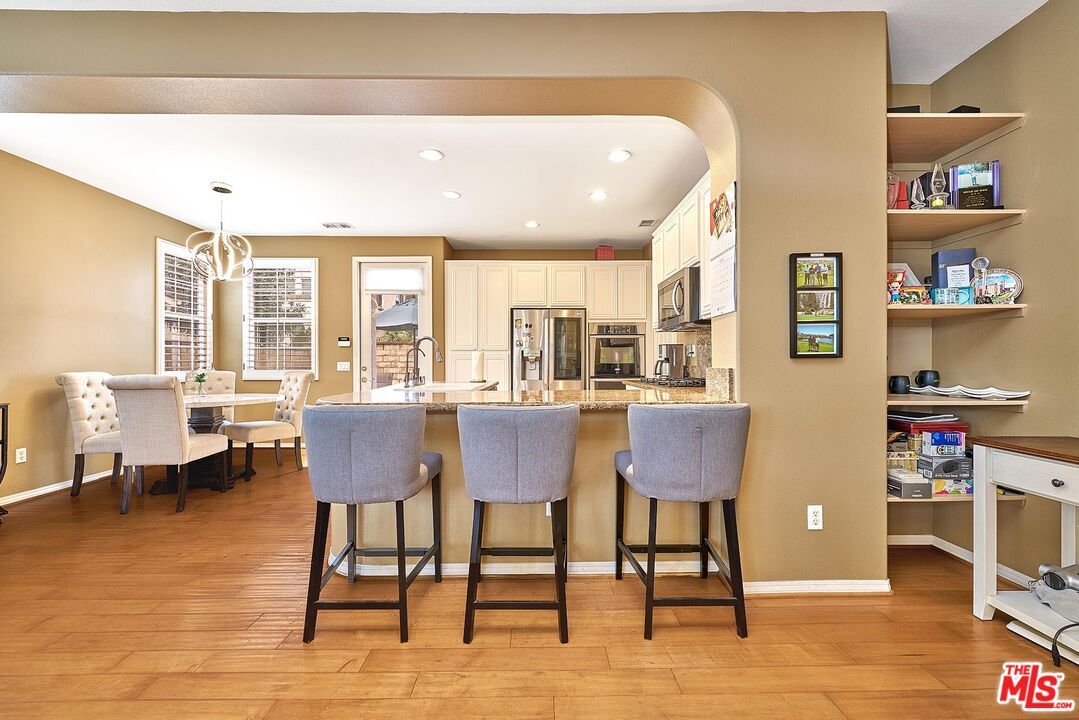 Dining room, Interior, Kitchen, Pendant Lights, Recessed Lighting, Stainless Steel Appliances, Wood Texture Flooring