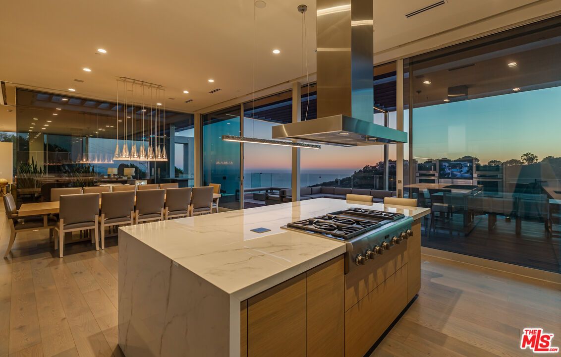 Dining room, Interior, Kitchen, Pendant Lights, Recessed Lighting, Stainless Steel Appliances, Water, Wood Texture Flooring