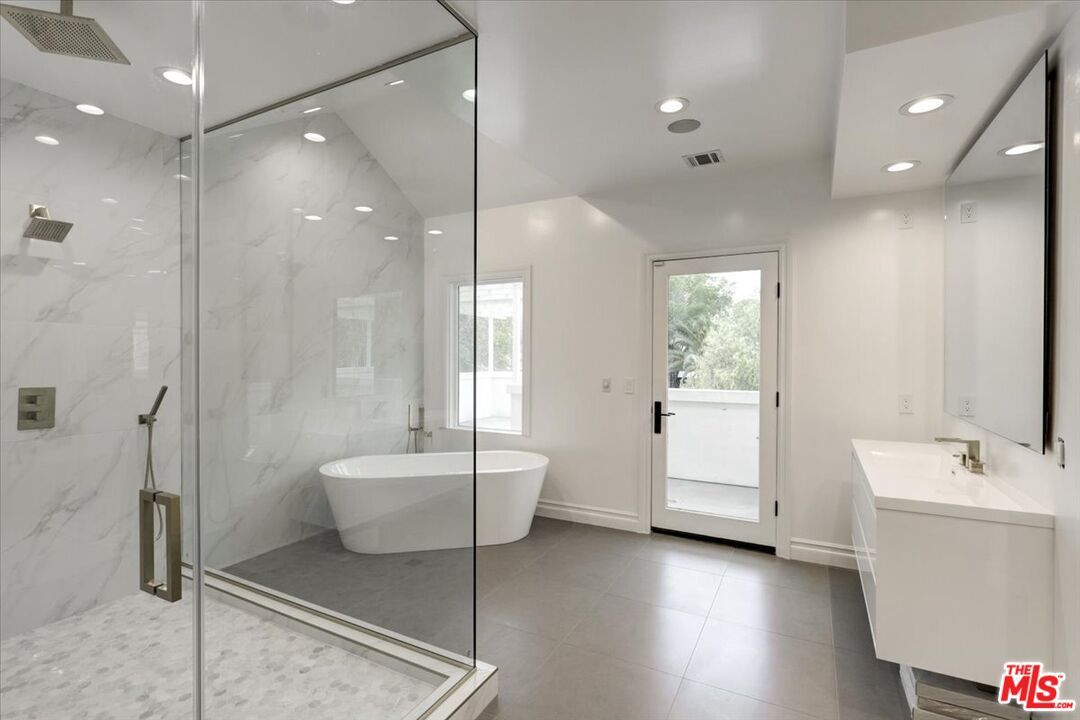 Bathroom, Free Standing Baths, Glass Shower, Interior, Marble Walls, Recessed Lighting