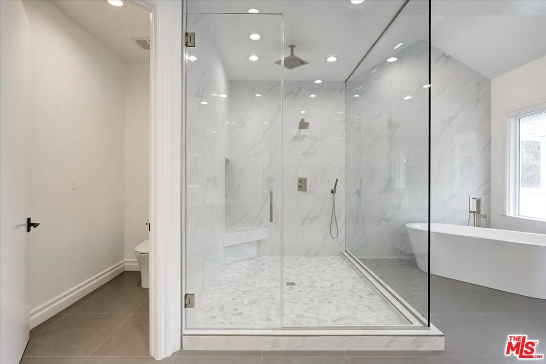 Bathroom, Free Standing Baths, Glass Shower, Interior, Marble Walls, Recessed Lighting