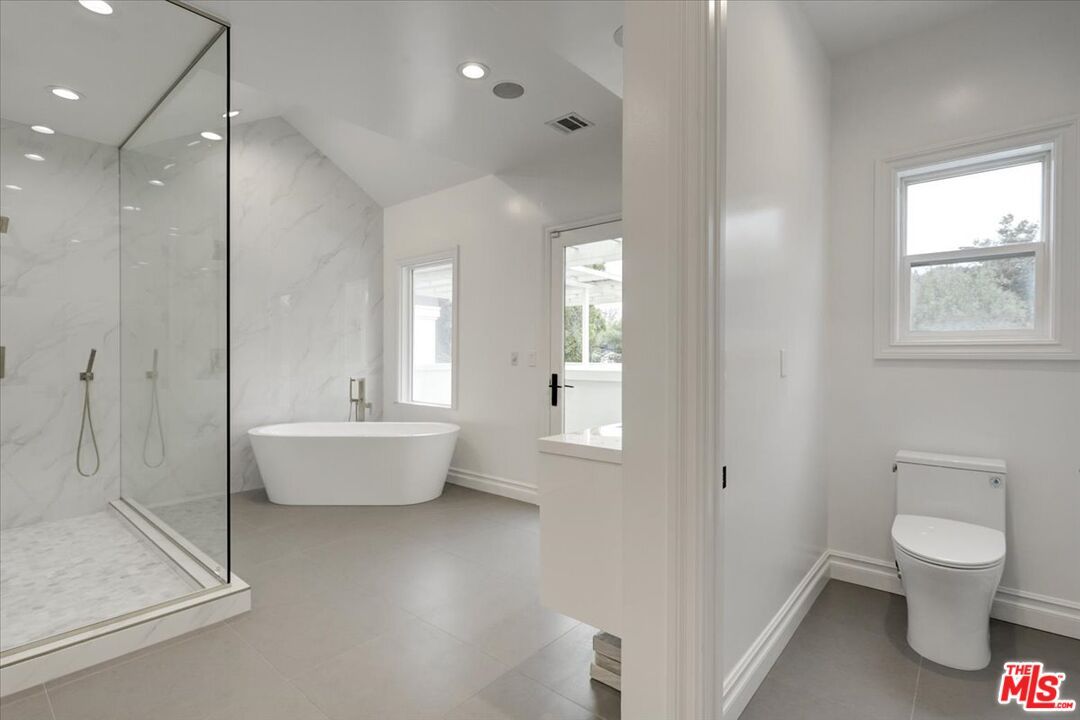 Bathroom, Free Standing Baths, Glass Shower, Interior, Marble Walls, Recessed Lighting