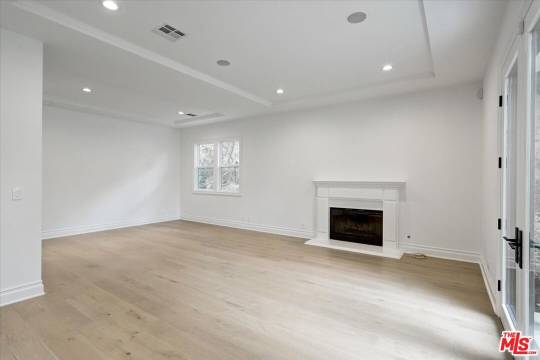 Empty room, Fireplace, Interior, Recessed Lighting, Wood Texture Flooring