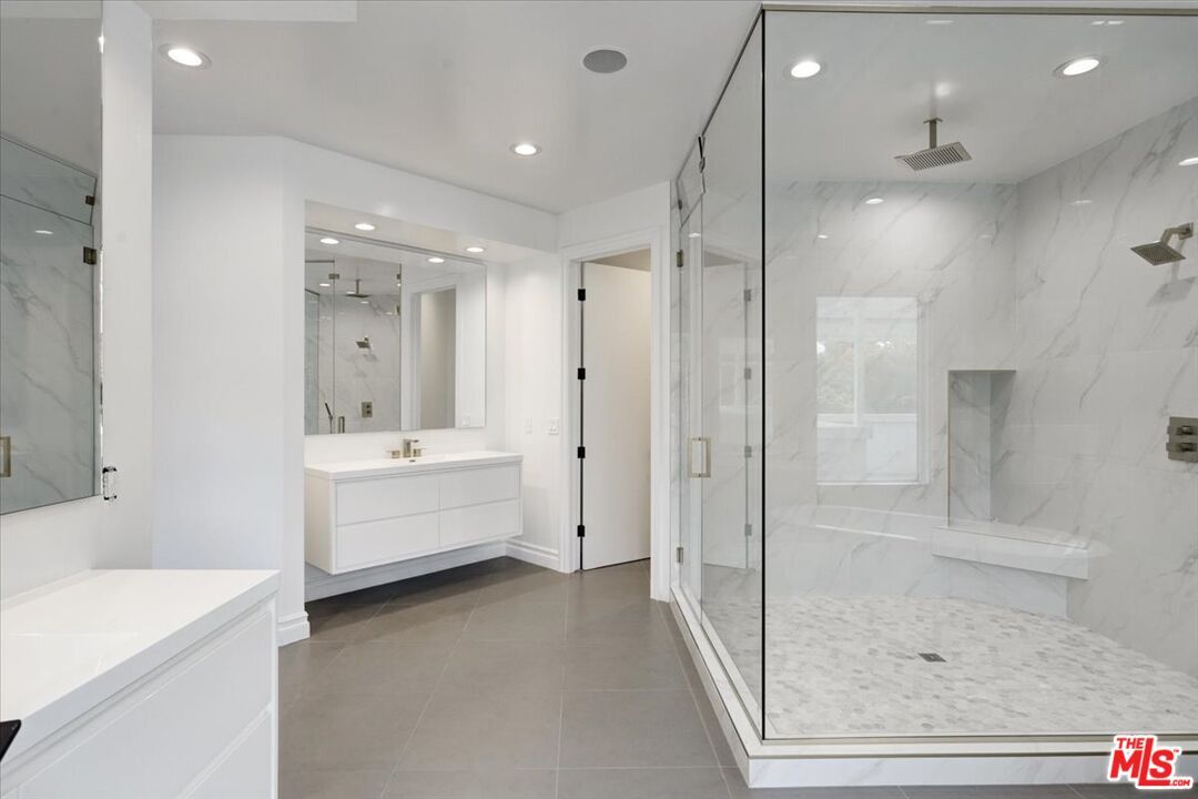 Bathroom, Dual Sink Vanities, Glass Shower, Interior, Marble Walls, Recessed Lighting