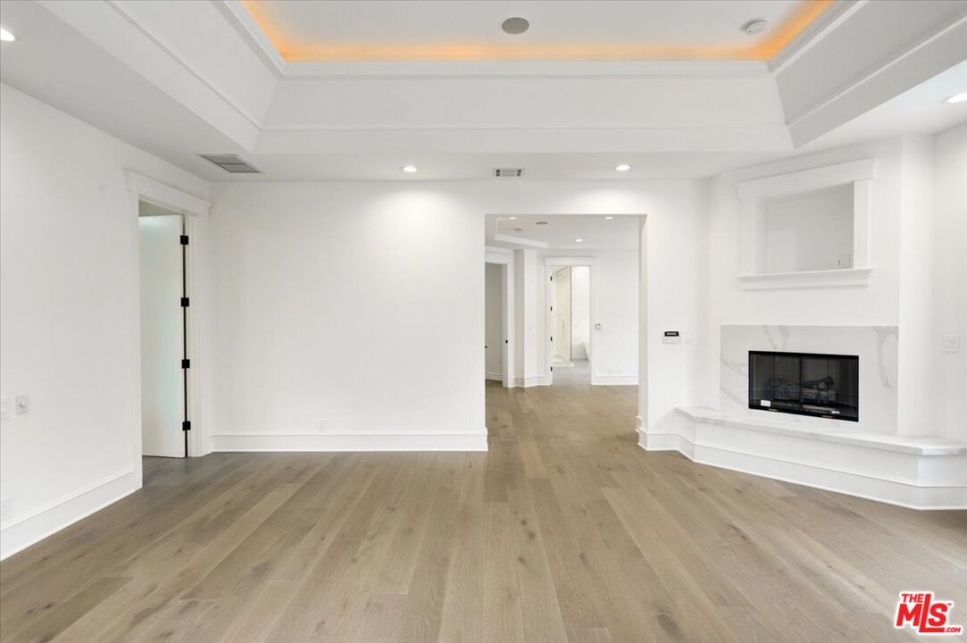 Empty room, Fireplace, Interior, Recessed Lighting, Wood Texture Flooring