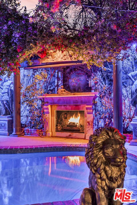 Exterior, Fireplace, Pool