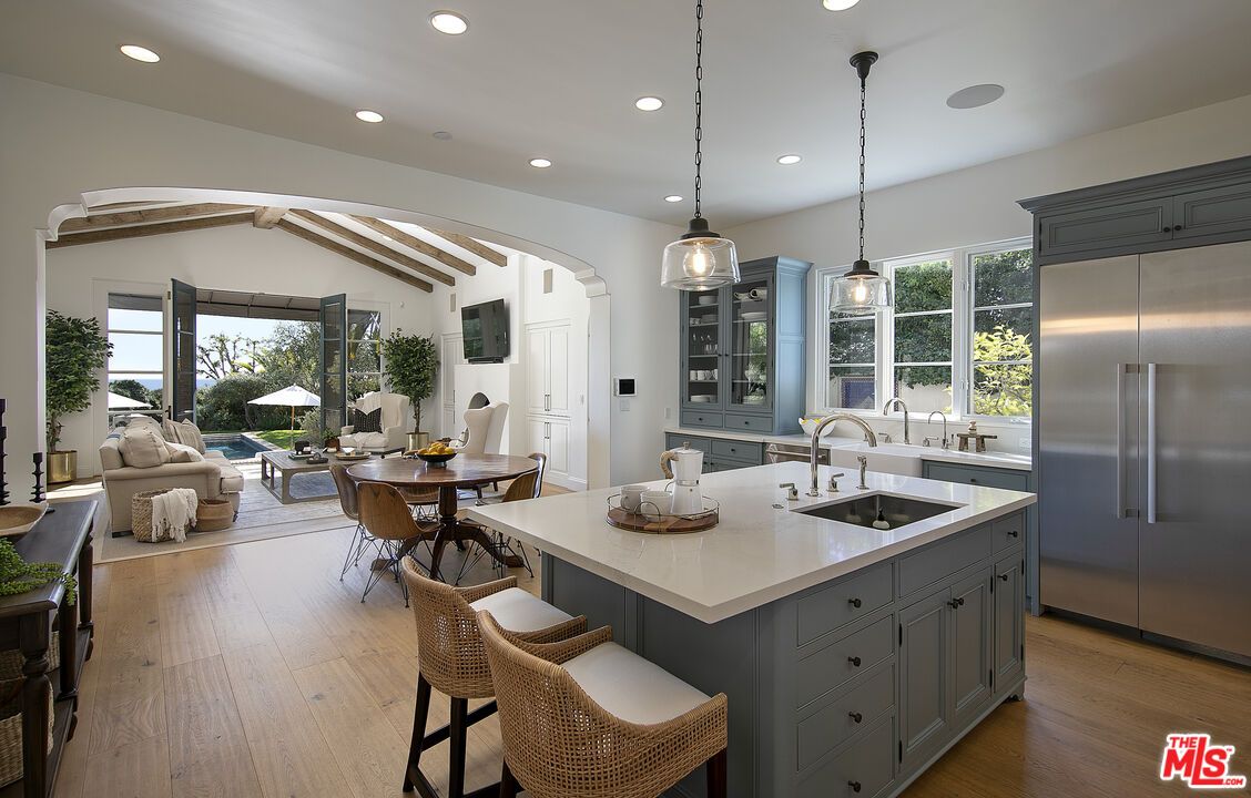 Dining room, Interior, Kitchen, Living room, Pendant Lights, Recessed Lighting, Stainless Steel Appliances, Wooden Beams, Wood Texture Flooring