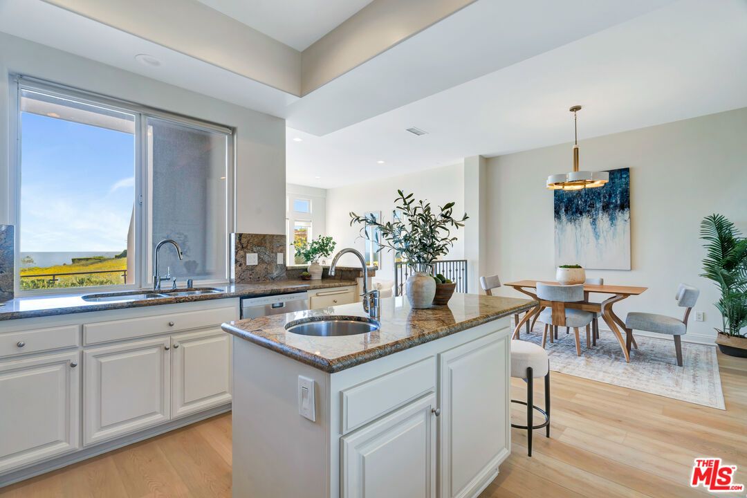 Dining room, Interior, Kitchen, Pendant Lights, Recessed Lighting, Water, Wood Texture Flooring